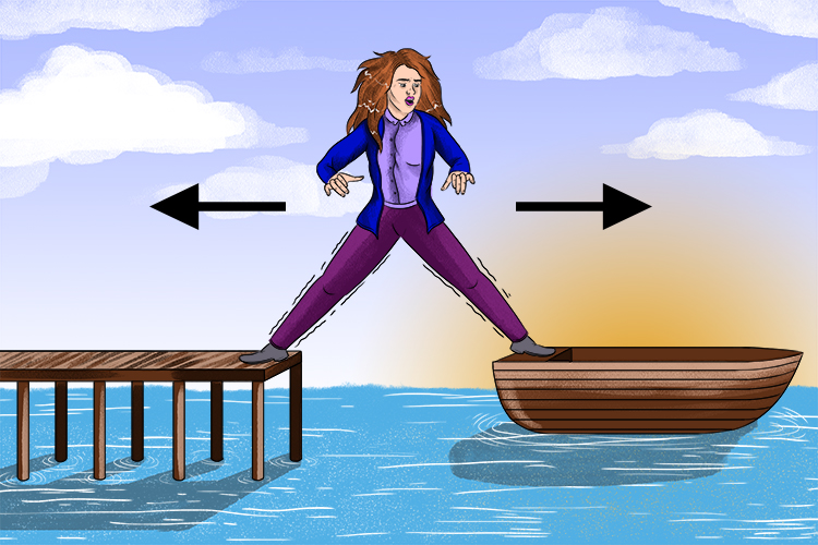 Woman stepping between a boat and a pier.